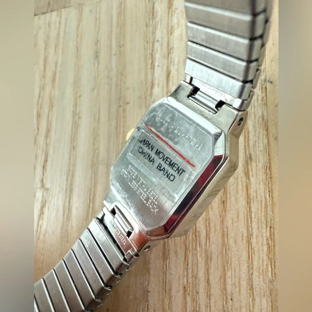 Caravelle by Bulova ladies hexagonal two tone dress watch NEW BATTERY